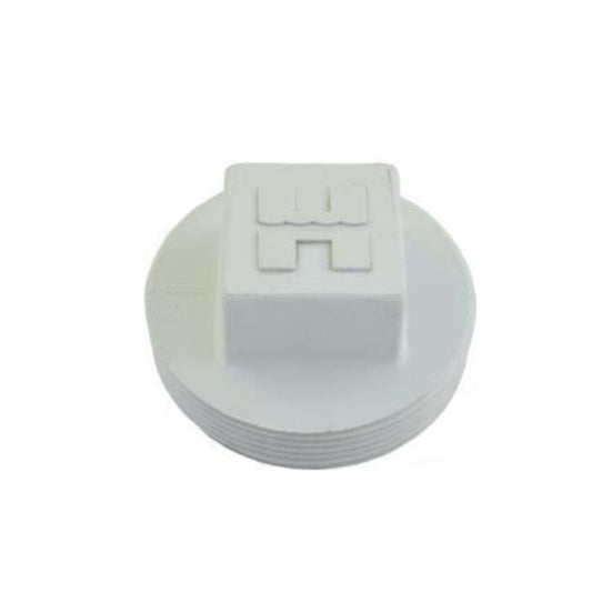 A 2" white plastic pipe plug from Swimming Pool Discounters features a raised square top with an embossed "H," shown from above on a white background—perfect as a replacement for Hayward suction outlet fittings.